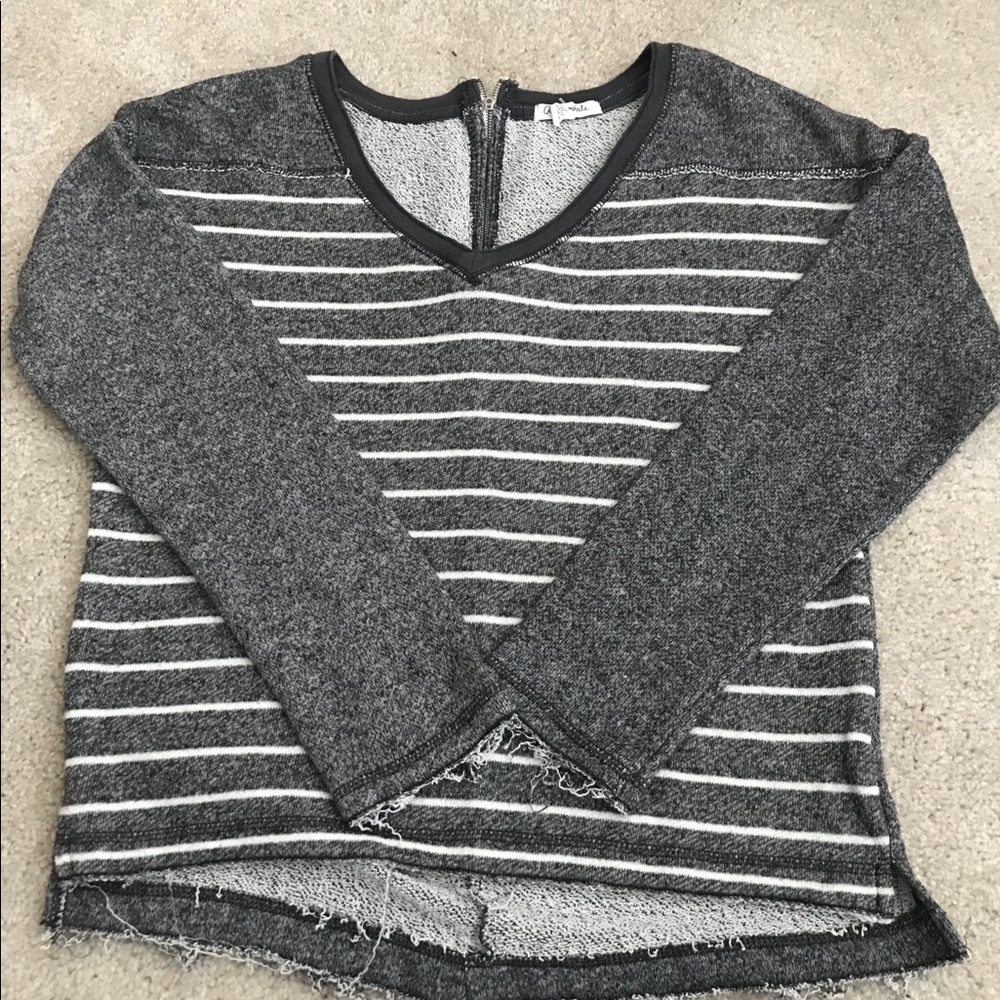 Sweater with fringed ends